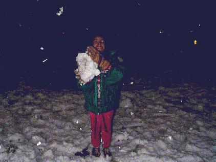 Katie and her first snowball.